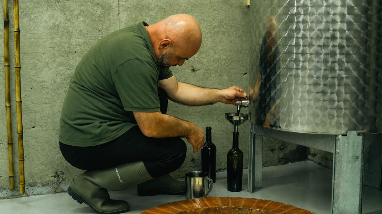 Filling bottles by hand on bottling day